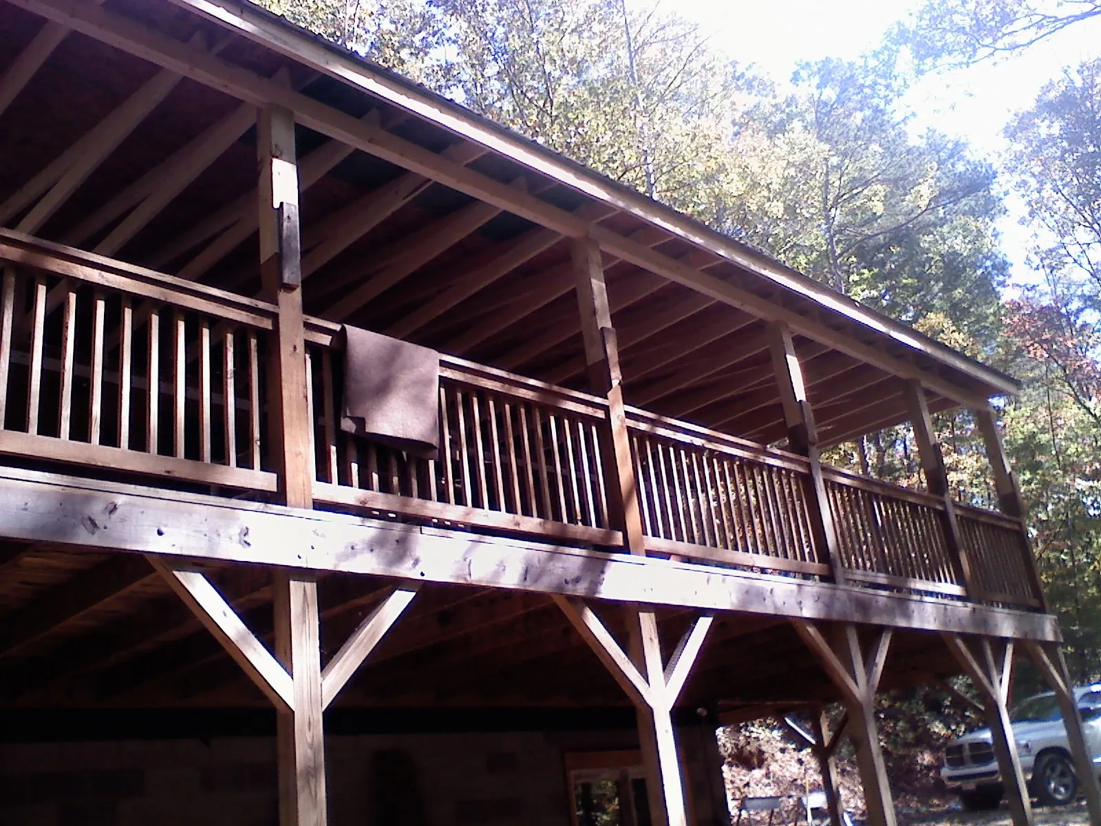 Timber framing under a new elevated porch and deck — Roof Leak Repair in Weston by Roofing Brothers